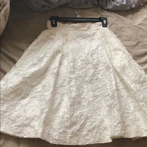 white knee-length skirt